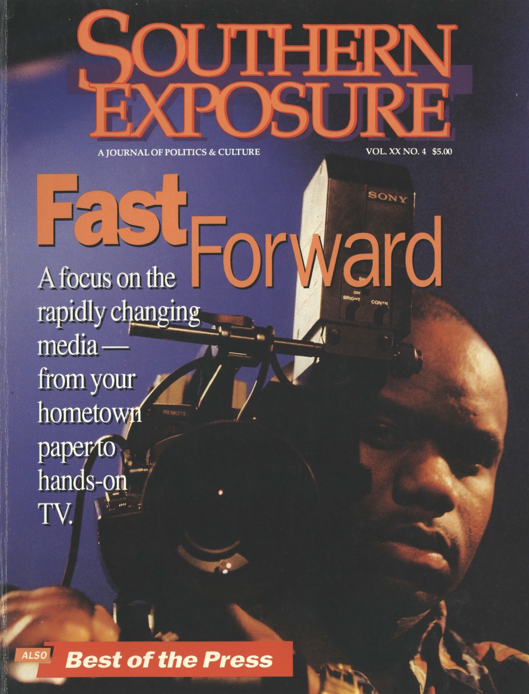 Magazine cover with photo of man with camera, reading "Fast Forward" 