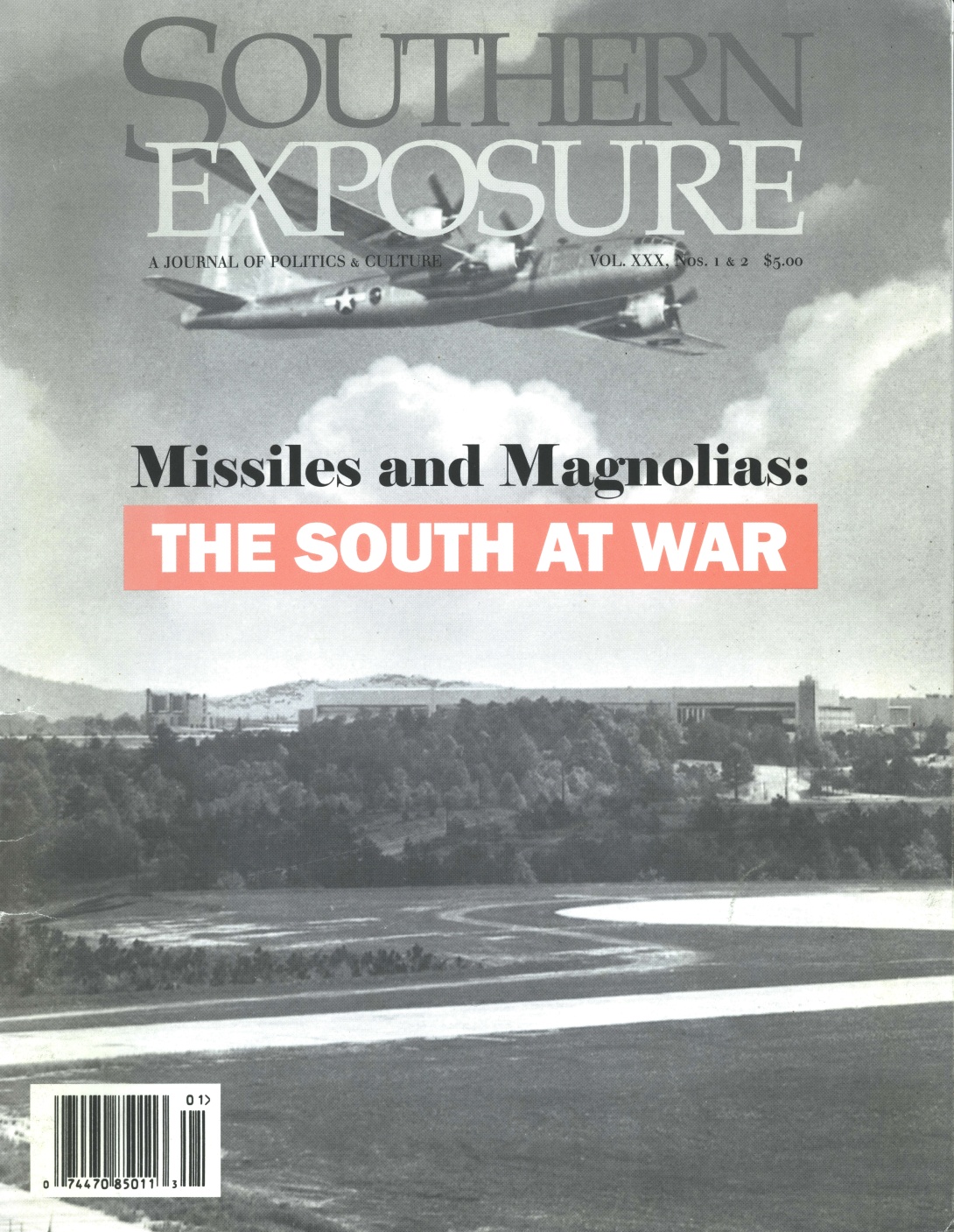 Magazine cover with black and white photo of landscape with large buildings in the background and warplane flying overhead, text reads "Missiles and Magnolias: the South at War" 