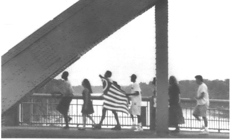 Activists marching across the Selma bridge