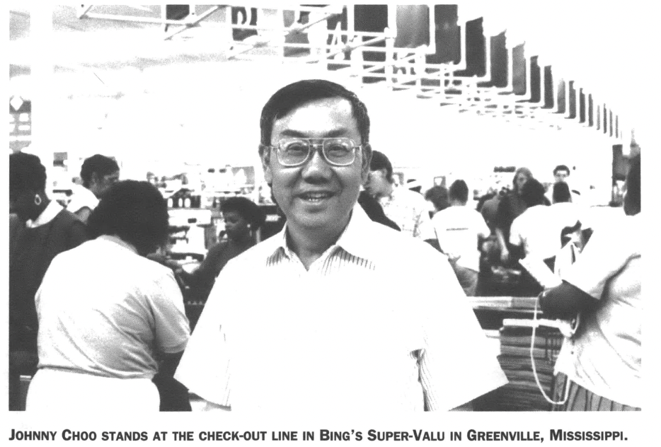 Johnny Choo stands at the checkout line in Bing's Super-Valu in Greenville, Mississippi