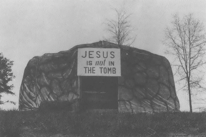 Fake stone tomb that reads "Jesus is not in the Tomb"