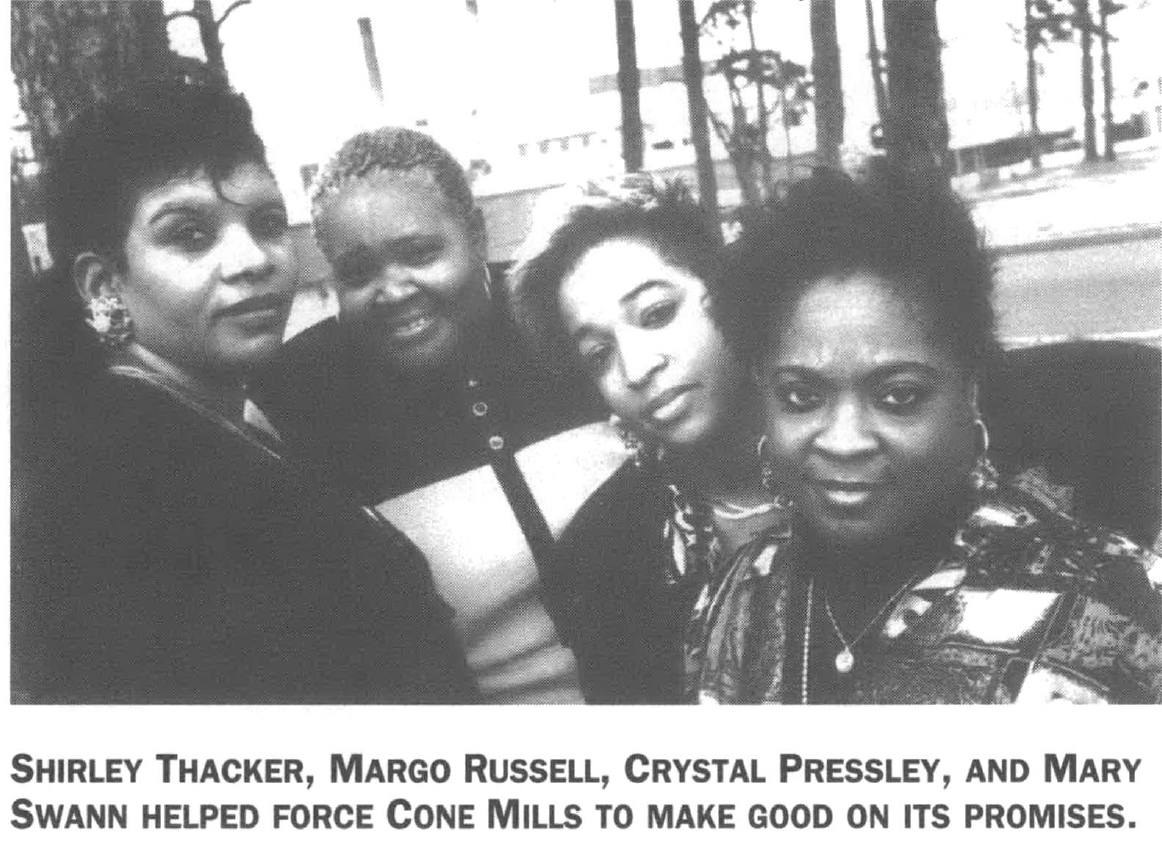 Four Black women looking into camera, standing outside