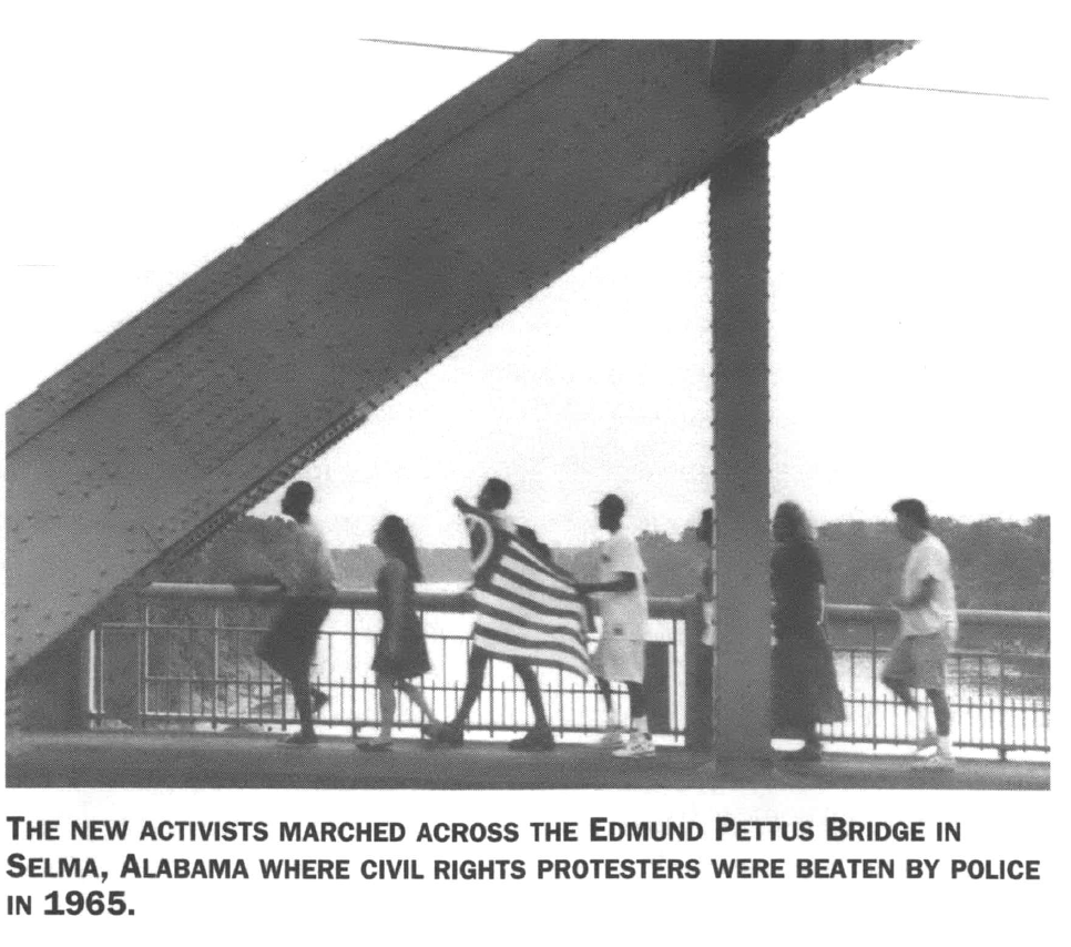 Activists marching across the Selma bridge