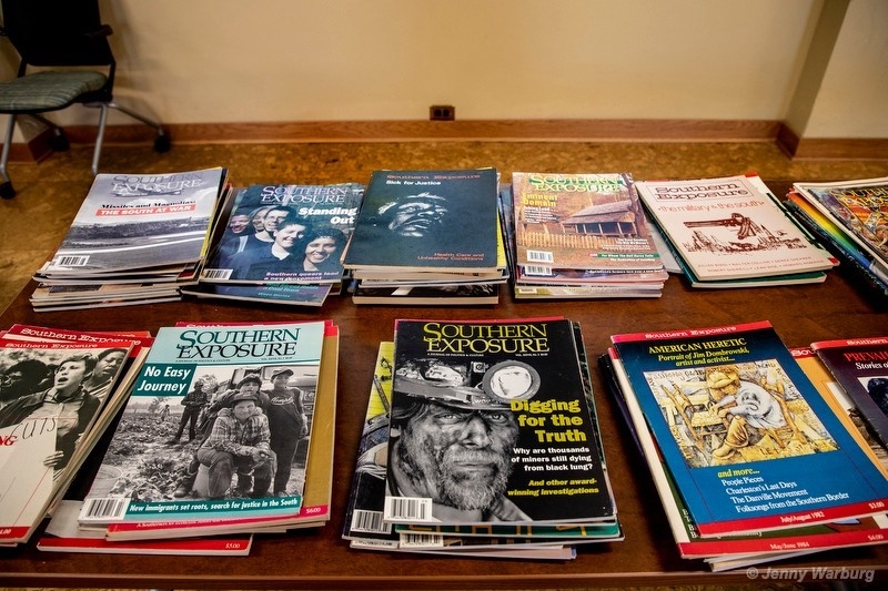 Stacks of Southern Exposure issues on a table